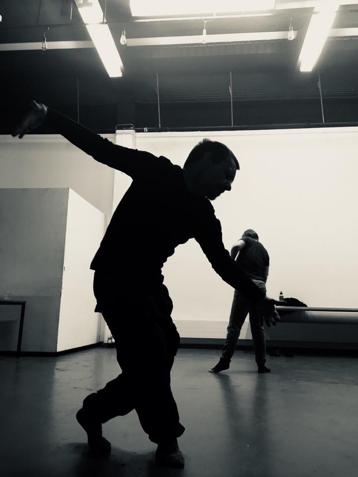 Black and white photo of a dancer in silhouette