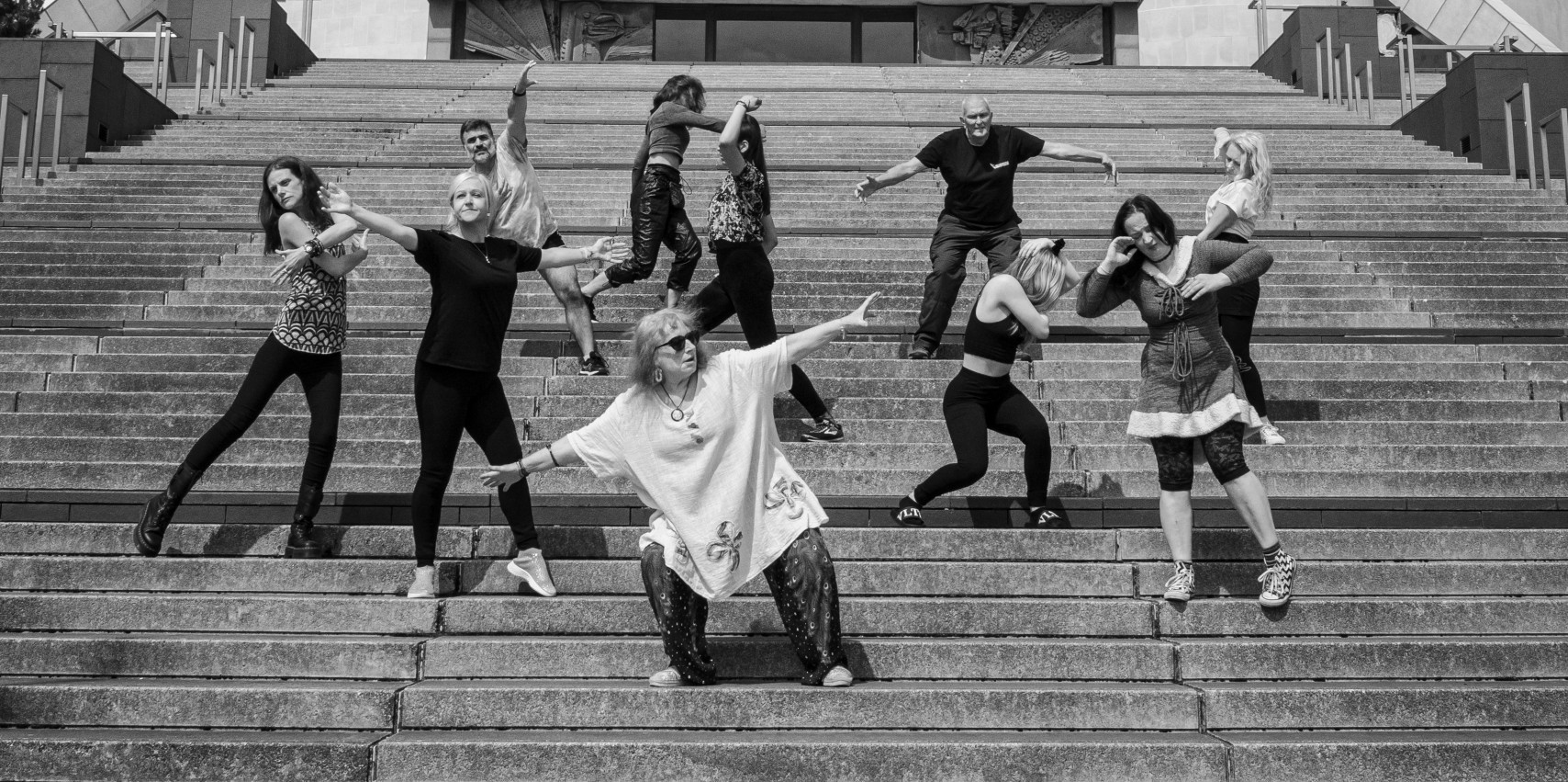 Black and white photo of Fallen Angel Dance Theatre dancers in front of the Liverpool Cathedral