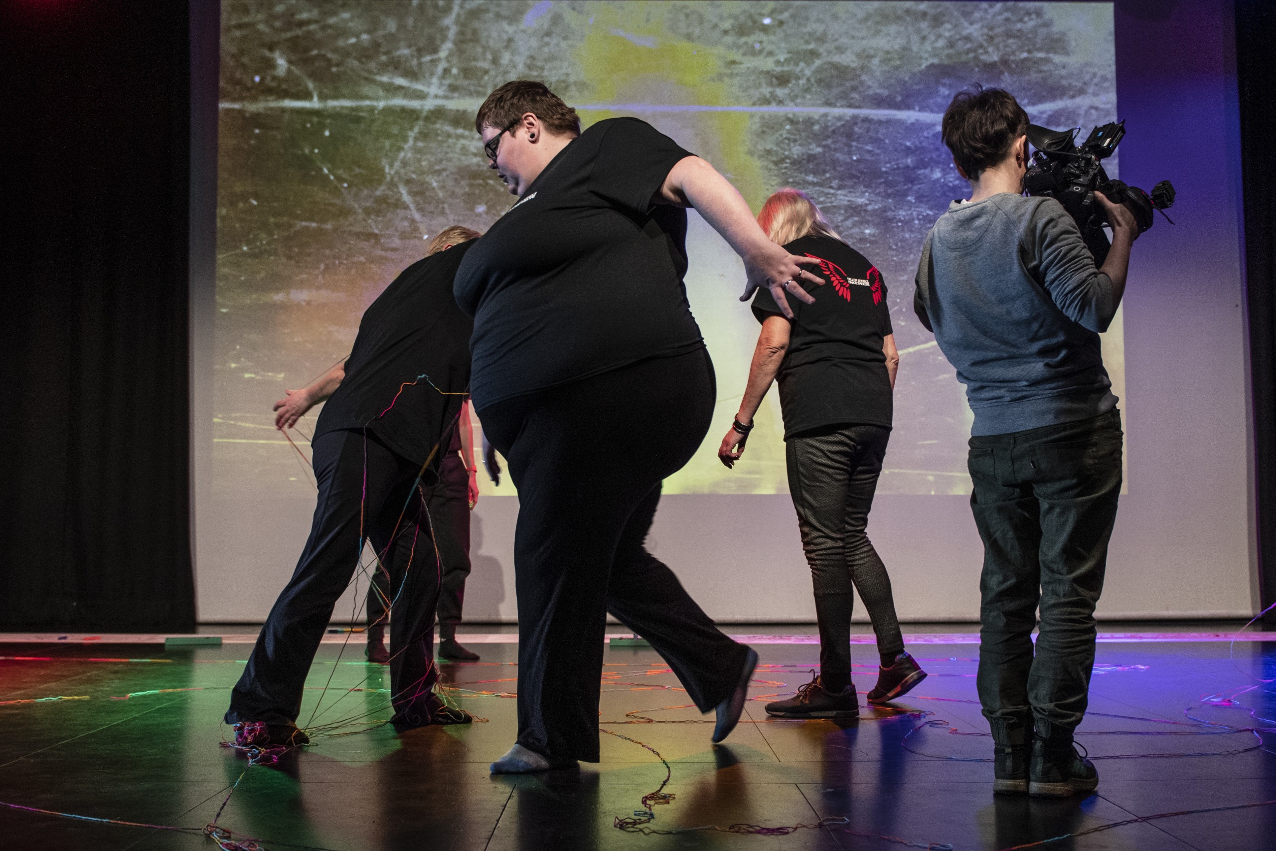 Dancer moving across stage