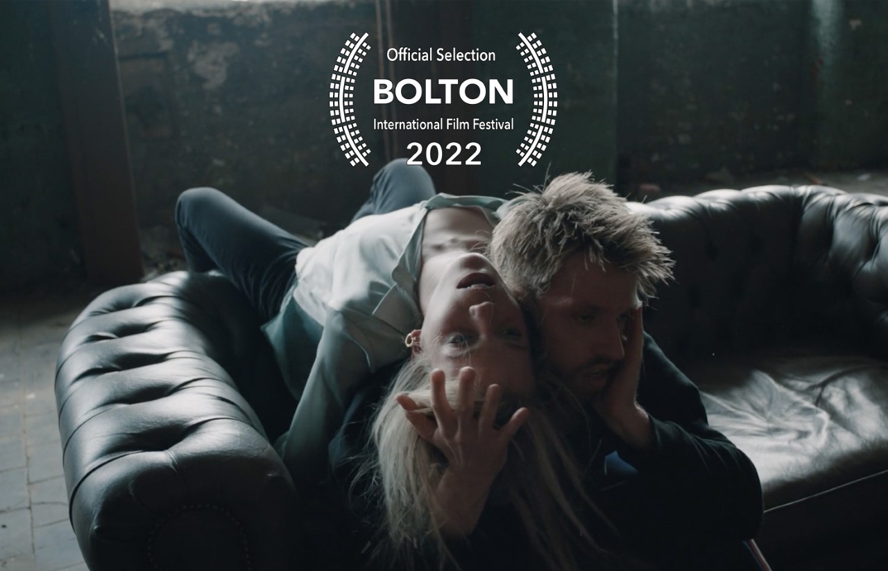 Film still from I fall with sign - Official selection Bolton International Film Festival